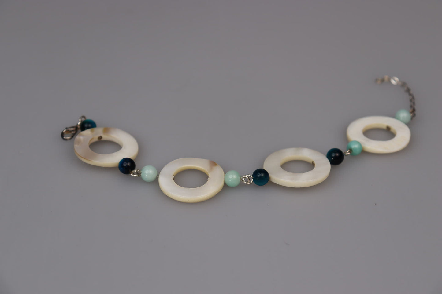 Mother of Pearl Donut, Aquamarine Tiger's Eye, Green Chalcedony, and Silver Bracelet